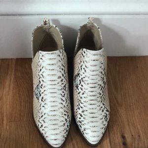 Snakeskin boots by CL Laundry